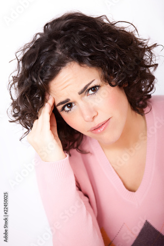 Young woman suffering a headache