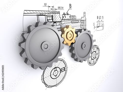 metallic gears against a background of engineering drawings