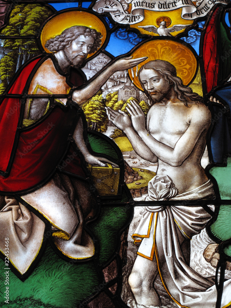medieval stained The baptism of Christ by John the Baptist Stock Photo
