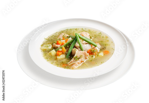 Appetizing soup with meat and vegetables in plate