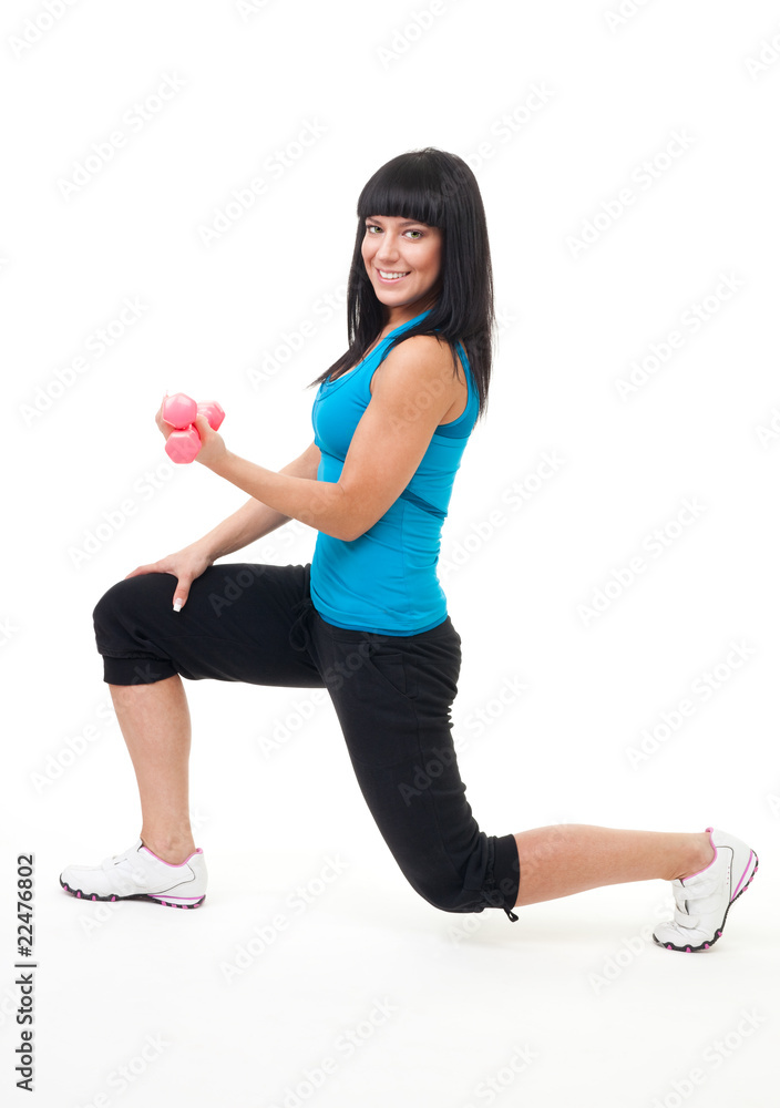 Woman do fitness stand with dumbbells Woman do fitness stand with dumbbells