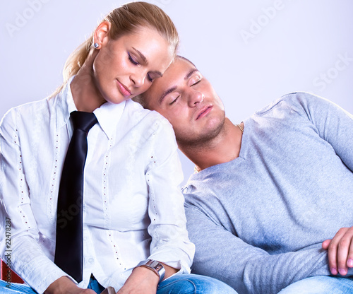 business team man laying on woman's shoulder photo