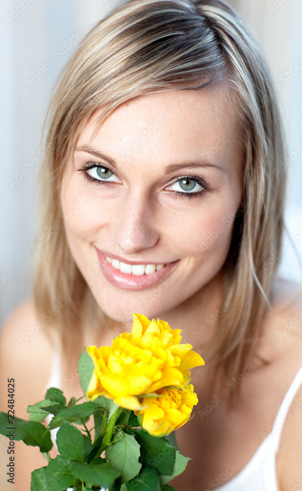 Portrait of a bright woman holding yellow roses Portrait of a bright woman holding yellow roses