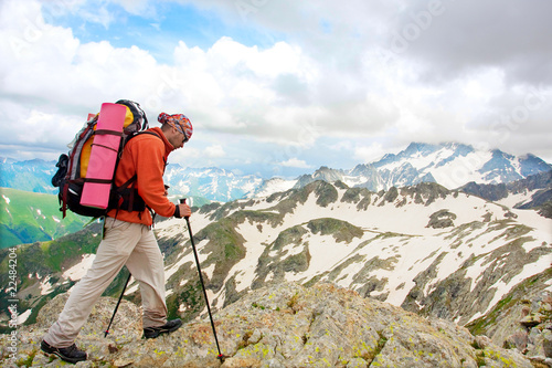 Hiker in Caucasus mountains