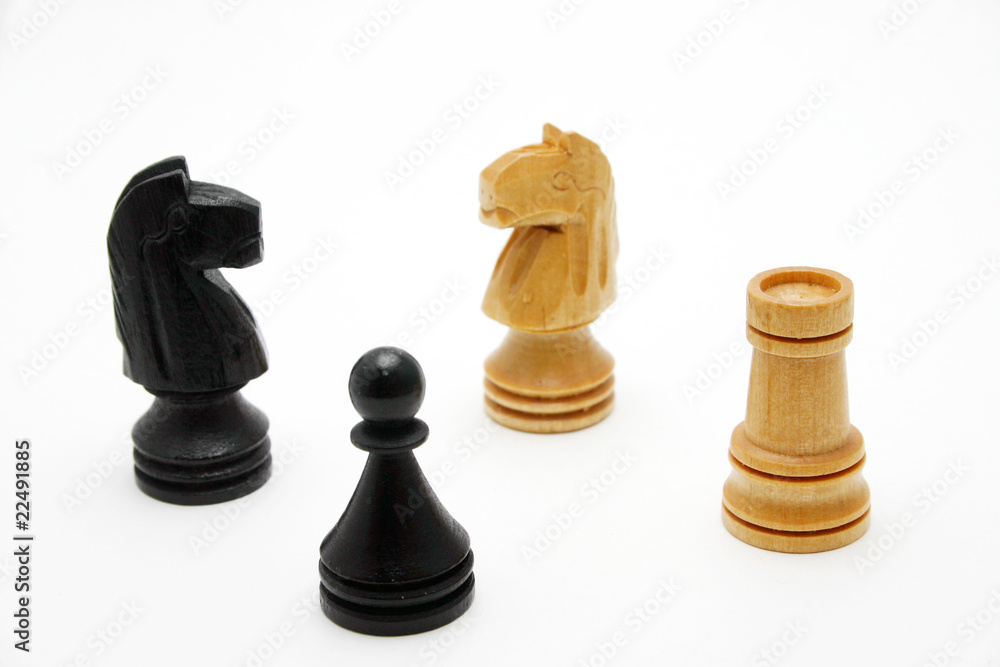 Wood chess pieces knight, queen,pawn and castle. Wood chess pieces knight, queen,pawn and castle.