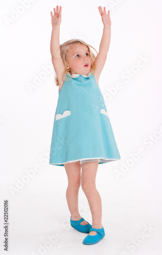 Little girl with hands up