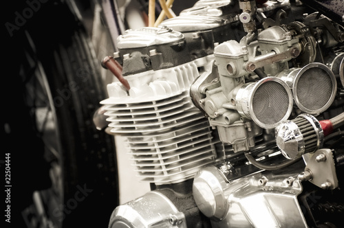 Φωτογραφία motorcycle carburetor and engine parts closeup