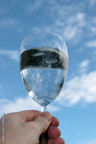 glass of water against a blue sky toast © dahi