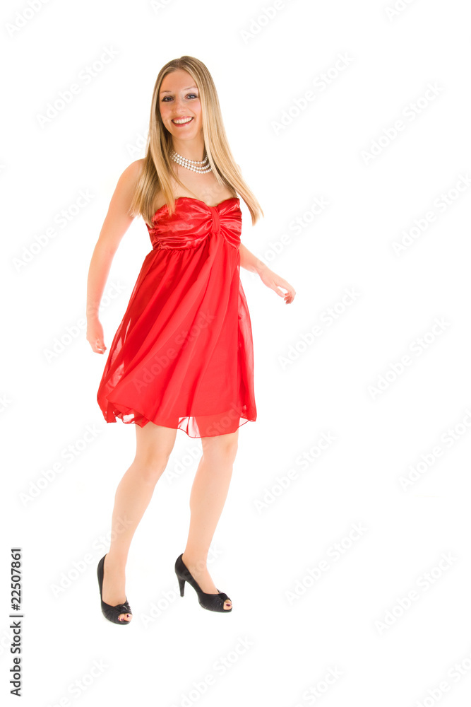 Isolated caucasian blond woman in red dress Isolated caucasian blond woman in red dress