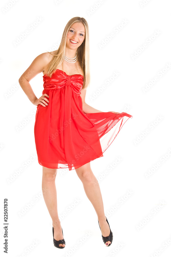 Isolated caucasian blond woman in red dress Isolated caucasian blond woman in red dress