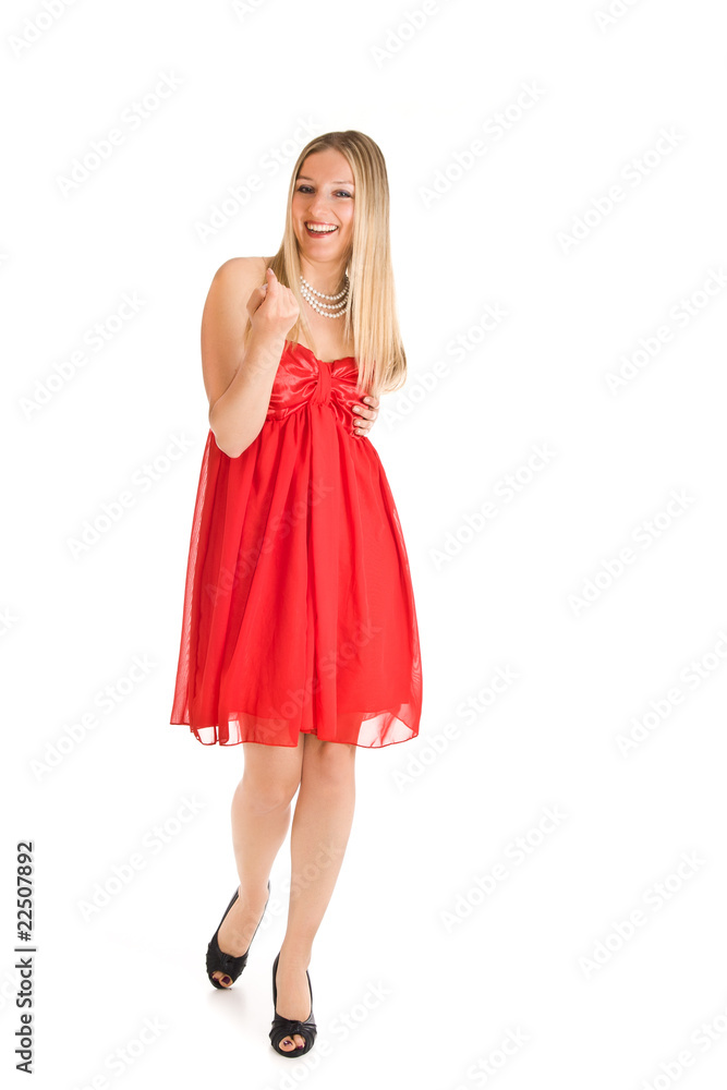 Isolated caucasian blond woman in red dress