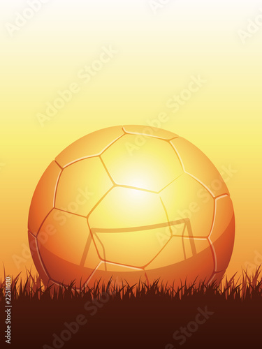 golden soccer ball reflecting goal