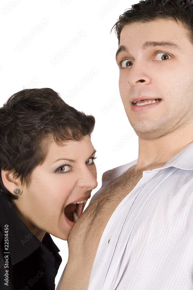 brunette embracing man and going to bite him brunette embracing man and going to bite him