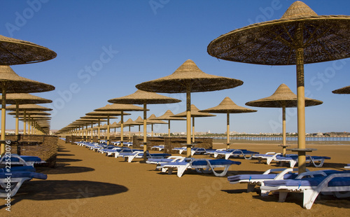 Beach umbrella on the shore of the Red Sea. Hurghada  Egypt.