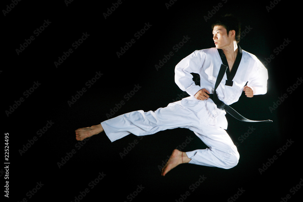 one asian man is playing with taekwondo one asian man is playing with taekwondo