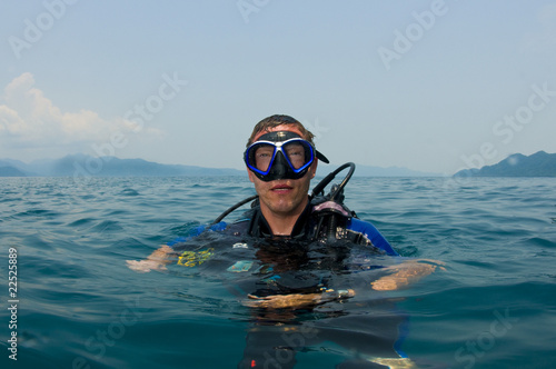 scuba diver on surface