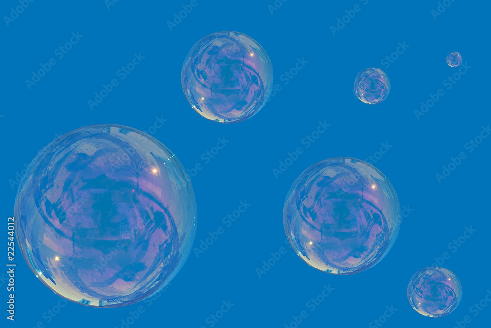 many soap bubbles over a blue sky many soap bubbles over a blue sky