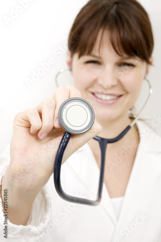 portrait of a young caucasian woman doctor with stethoscope