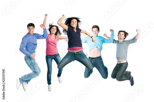 Joyful young happy people jumping