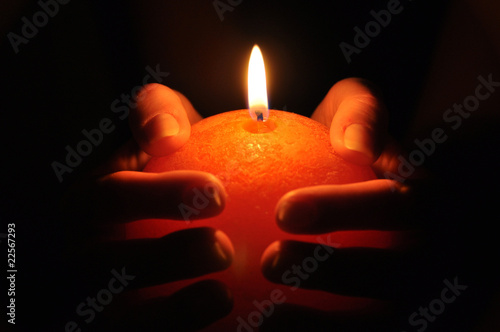 Candle in the hands