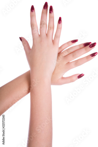 Two woman hands with moisturizer body cream