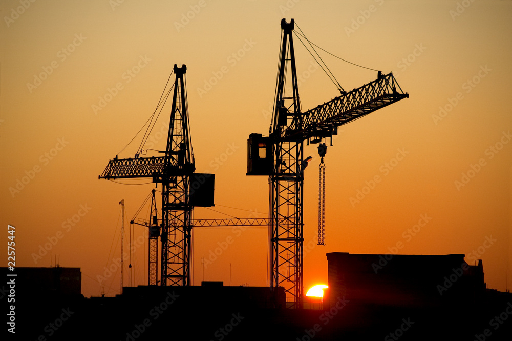 Industrial silhouettes at sunrise.