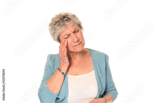 Senior older woman with headache