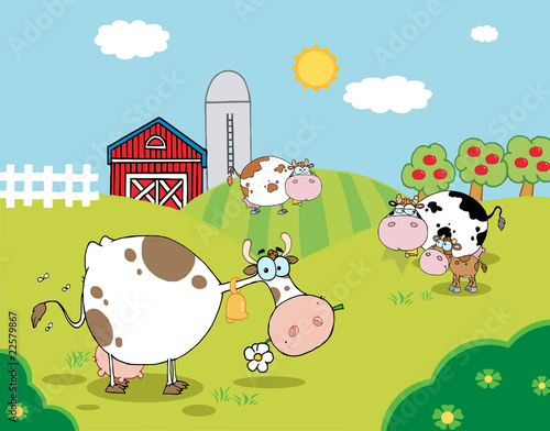 Pasture Of Grazing Dairy Cows Near A Barn And Silo