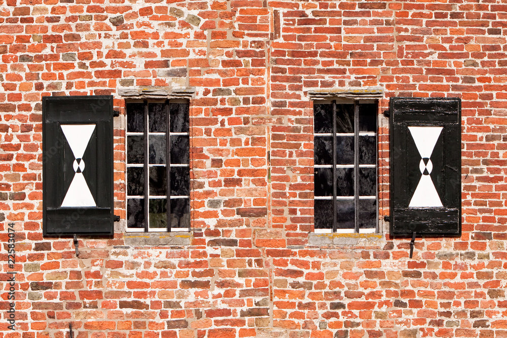 Detail of a brick wall with windows