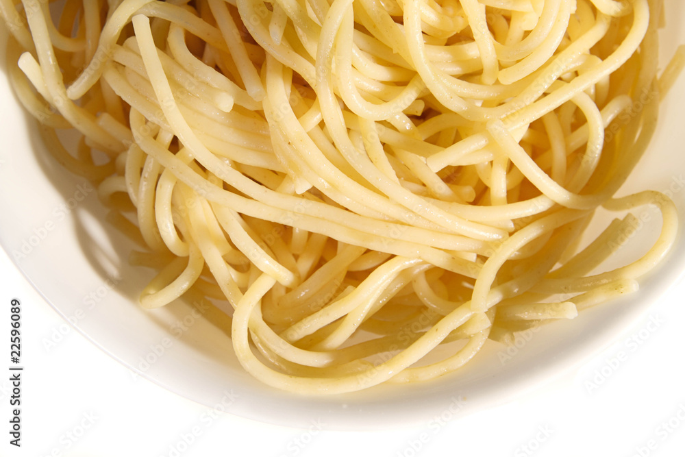 Bowl of cooked spaghetti isolated on white Bowl of cooked spaghetti isolated on white