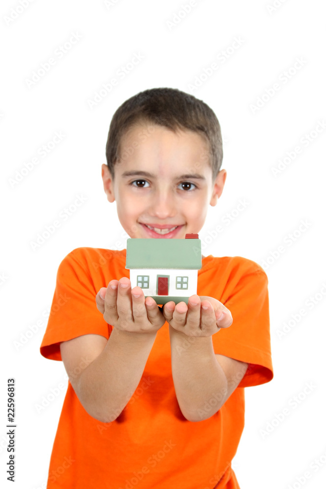 boy holdind a toy house