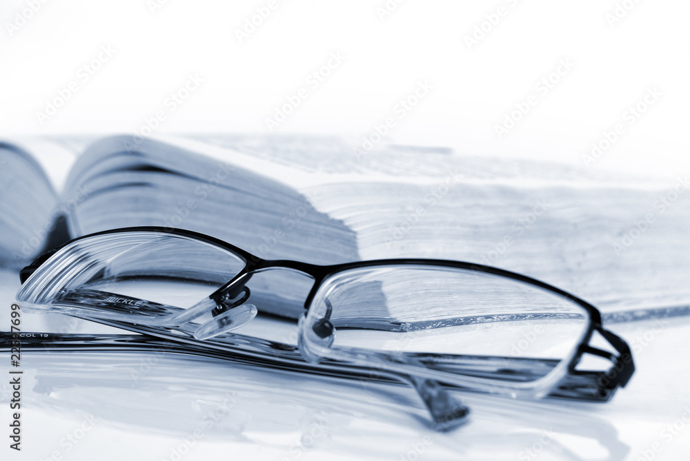 dictionary & pen with glasses
