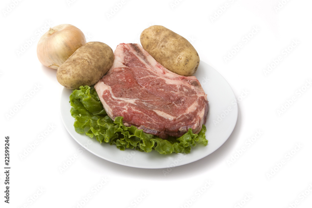 Raw steak and vegetables Raw steak and vegetables