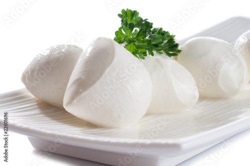 Obraz na płótnie mozzarella with parsley on dish