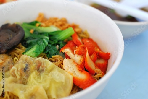 Oriental style pork dumpling noodles