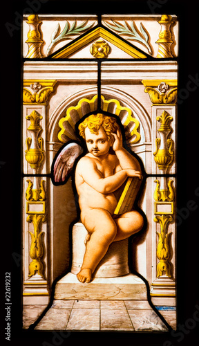 Cherub detail from a stained glass of Blois Chateau, France