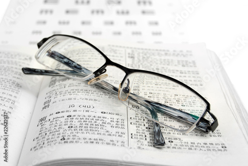 dictionary and glasses