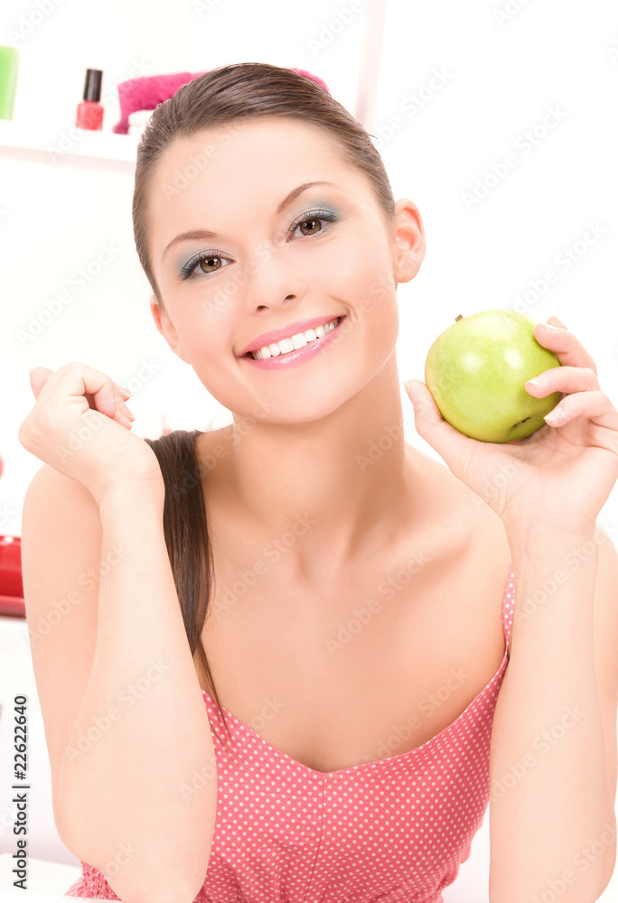 young beautiful woman with green apple young beautiful woman with green apple