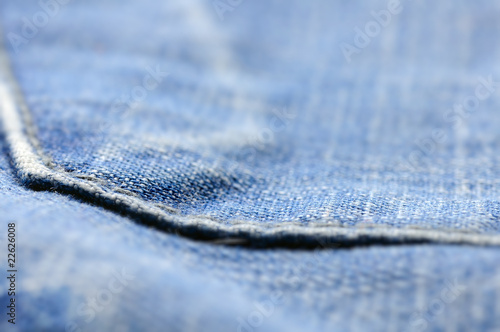 closeup of blue jeans pocket, shallow dof © Sergey Peterman