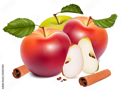 Ripe red apples with green leaves and cinnamon.