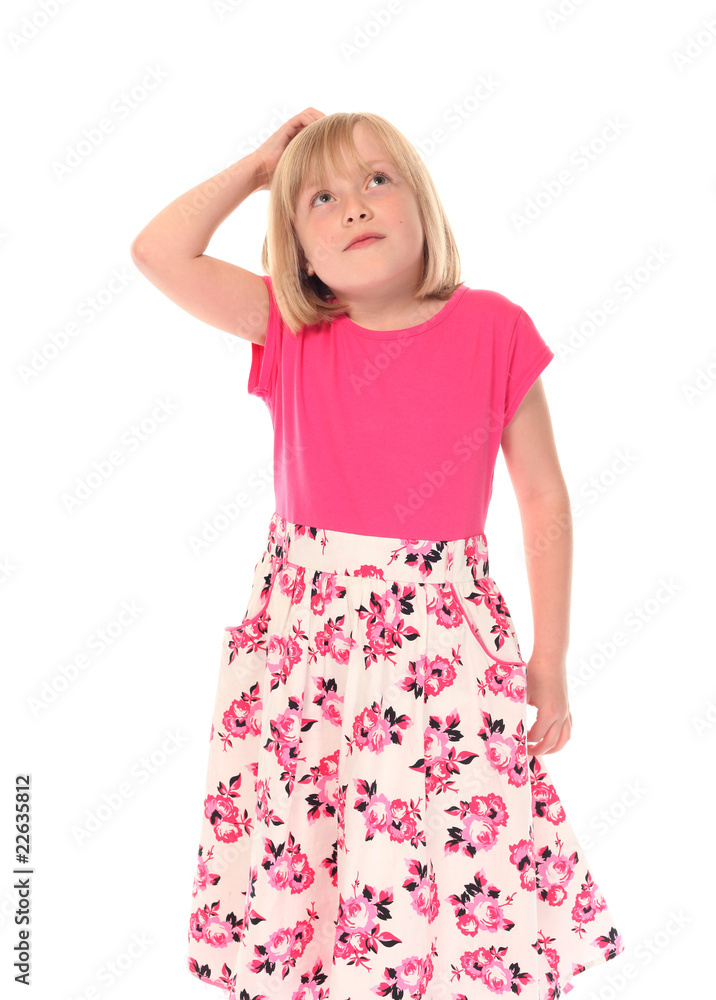 Young little girl scratching head Young little girl scratching head