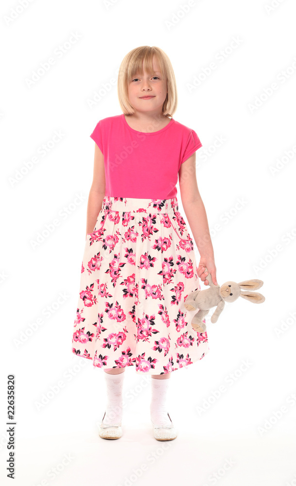 Young little girl with soft toy