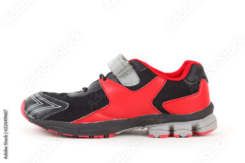 Sports shoes, black and red colors on white. Isolated.