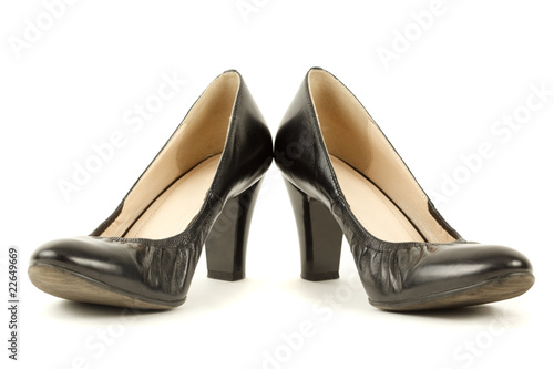 Pair of black women's high heels. Isolated on white background.