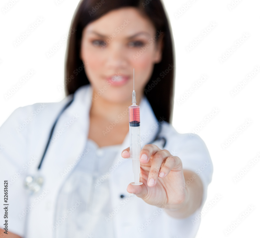 Professionnal female doctor holding a syringe Professionnal female doctor holding a syringe