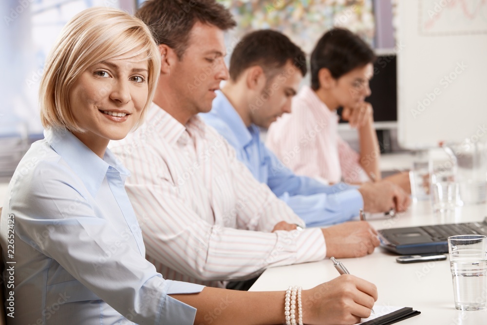 Happy businesswoman in business meeting Happy businesswoman in business meeting