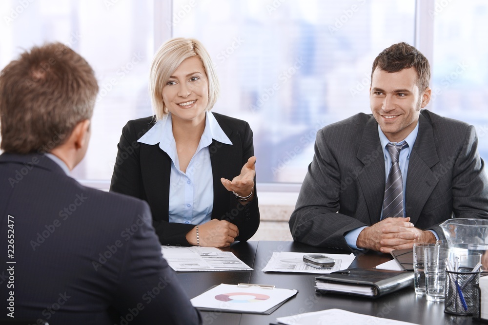 Confident businesspeople in office Confident businesspeople in office