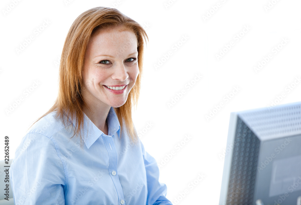 Radiant business woman working on a computer Radiant business woman working on a computer