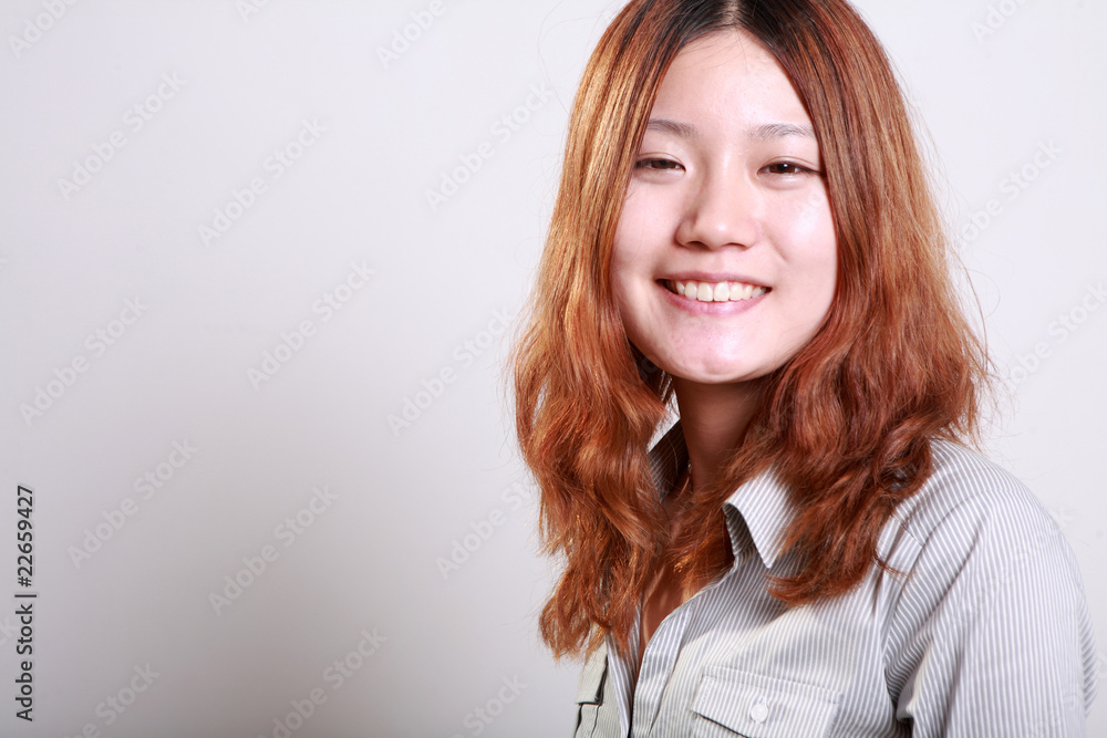 portrait of pretty young Asian girl smiling . portrait of pretty young Asian girl smiling .