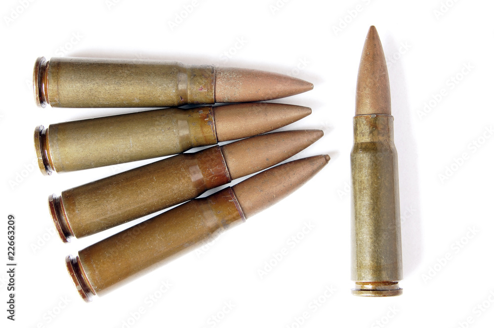 Five old and messy bullets isolated on white background Five old and messy bullets isolated on white background